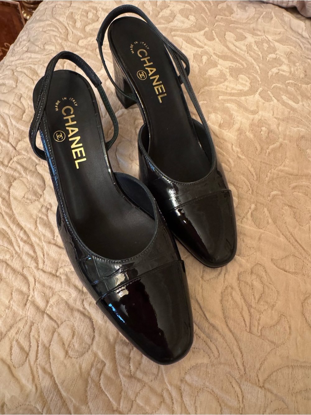 CHANEL Black Patent Leather Slingback Pumps with Cap Toe